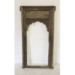 An Eastern decorative carved wooden window frame H152.5cm W75cm