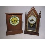 An oak mantle clock retailed by Sidney Hebert, Exeter along with an American mantle clock by