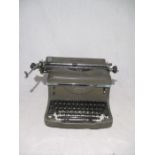 A vintage Oliver model 21 typewriter with cover