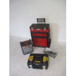 A collection of tools including a DeWalt drill set with impact and percussion driver plus
