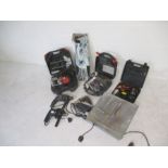 A collection of various power tools including Black & Decker, tile cutters, Mouse sander etc.