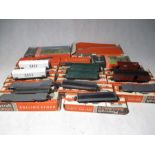 A collection of eleven boxed Playcraft Railways Rolling Stock including a Bogie Dropside Wagon,