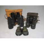 Two pairs of binoculars in carry cases including Zenith, along with one other