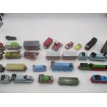 A collection of Thomas the Tank Engine and friends play worn die cast trains etc
