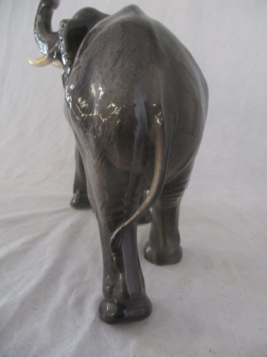 A ceramic elephant. Height 41cm. Has had a repair to one tusk. AF - Image 6 of 15