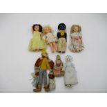 A collection of four vintage Rosebud dolls, along will three other dolls.
