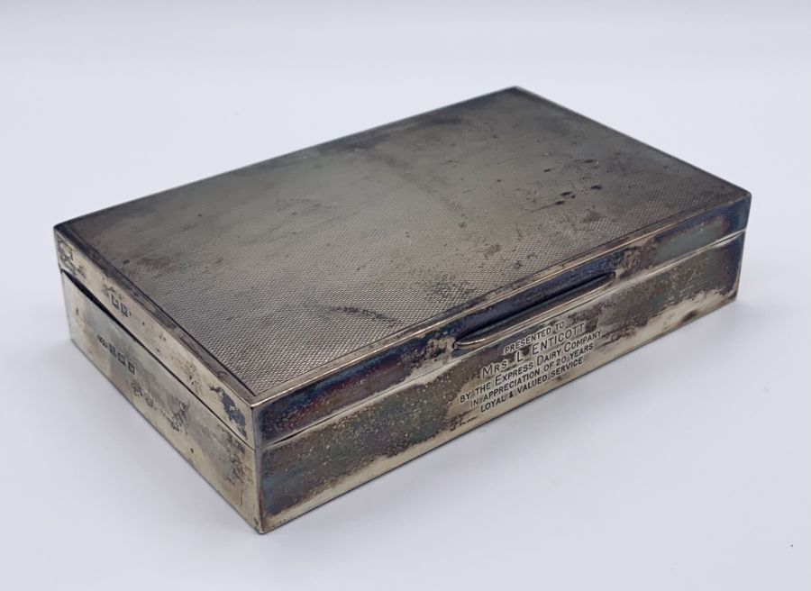 A hallmarked silver cigarette box