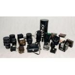 A collection of vintage lenses and camera including Olympus, Sirius etc.