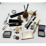 A collection of miscellaneous items including hallmarked silver sugar nips, Mate spoons, Dental