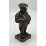 A bronze figure of a Georgian gentleman H14cm