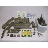 A collection of Hornby Dublo railway track with a few accessories, along with another of tub of