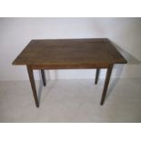 A rustic oak planked table - height 74cm, length 109cm width 70cm