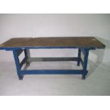 A large part painted wooden workbench L 230cm D72cm H 90cm