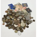 A small collection of various coinage, commemorative crowns, Indian banknotes etc.