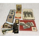 An assortment of items including vintage photographs including some on tin plate, vintage Ordnance