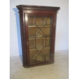 A Georgian corner display cabinet