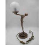 An art deco style lamp, the stem formed as a nude lady