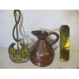 A copper gallon measure jug by Edgar & Son of Bristol of globular form and a loop handle.