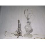 Two lamps, one cut glass, one silver plated.