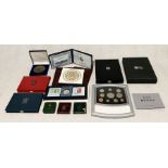 A collection of various proof sets, coins, medallions etc including a 1984 and 1990 United Kingdom