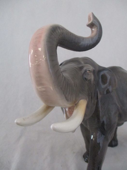 A ceramic elephant. Height 41cm. Has had a repair to one tusk. AF - Image 13 of 15