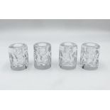 Four Kosta Boda candle holders, marks to base as shown