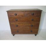A Victorian pine chest of five drawers