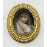 A Viennese style portrait of a young boy on porcelain plaque