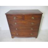 A Georgian mahogany bow fronted chest of drawers.