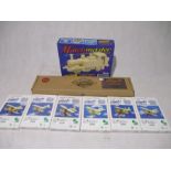 A collection of boxed wooden modelling kits including a Match master Steam Loco, six legends of