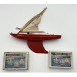A small "Star Yacht" pond boat along with two Camphor-Craft miniature model boats