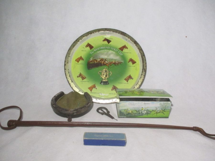 A collection of horse related memorabilia including a brass and iron ashtray formed as a hoof and