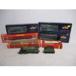 An unboxed Tri-ang Railway locomotive (8509) and tender, along with a selection of boxed railway