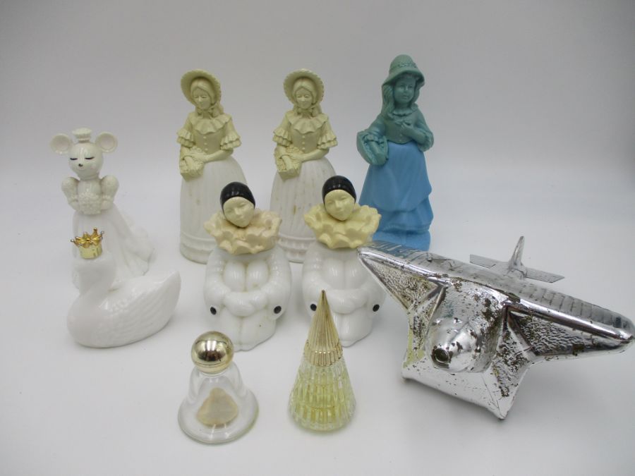 A collection of eight novelty Avon perfume bottles, along with two others