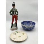 A Spode Blue Italian bowl along with and Irish Mist decanter and one other Copeland plate