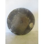 A weathered mill stone, diameter 76cm