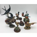 A collection of ceramic birds including a Karl Ens pair of swallows, country artists etc.