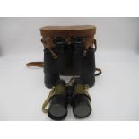 A pair of Boots Empire 10 x 50 coated optics binoculars in leather case, along with a pair of