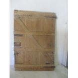 A wooden barn door. 183cm x 125cm