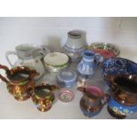 A collection of Maling Ware, Wedgewood, Copper Lustre jugs, etc