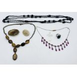 A small collection of jewellery including seed pearl brooch, agate brooch, French jet necklace,