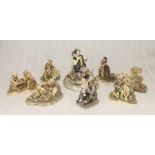 A collection of figurines including Capodimonte and Naturecraft
