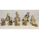 A collection of figurines including Capodimonte and Naturecraft