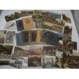 A collection of vintage postcards and Church Art Stamp Albums