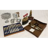 A collection of various items including Picquot Ware, silver plated cutlery, shaving set etc.