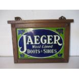 An Art Nouveau Jaeger Wool-Lined Boots & Shoes double-sided enamel sign in wooden hanging framed