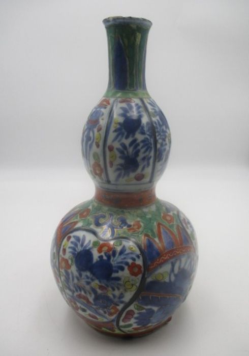 A Japanese 19th Century double gourd vase in the Imari palette, height 29cm