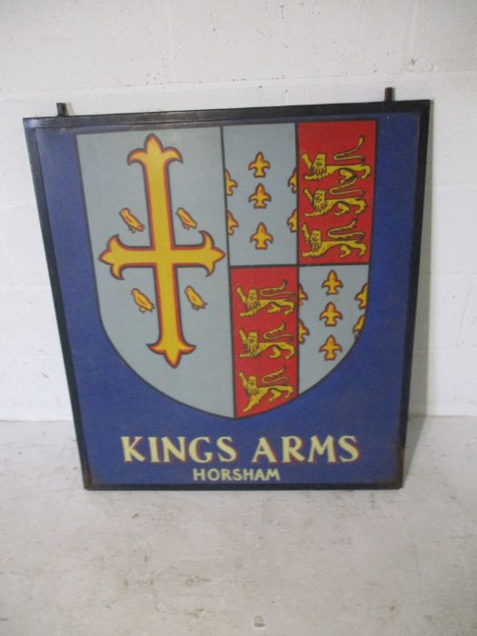 A metal framed double sided Kings Arms (Horsham) pub sign