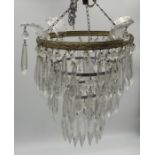 A crystal drop chandelier light fitting