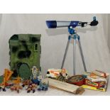 A collection of vintage toys including He-Man action figures with accessories, Castle Greyskull,